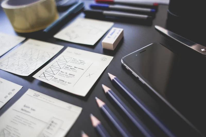 Notepads and pencils laying on a desk